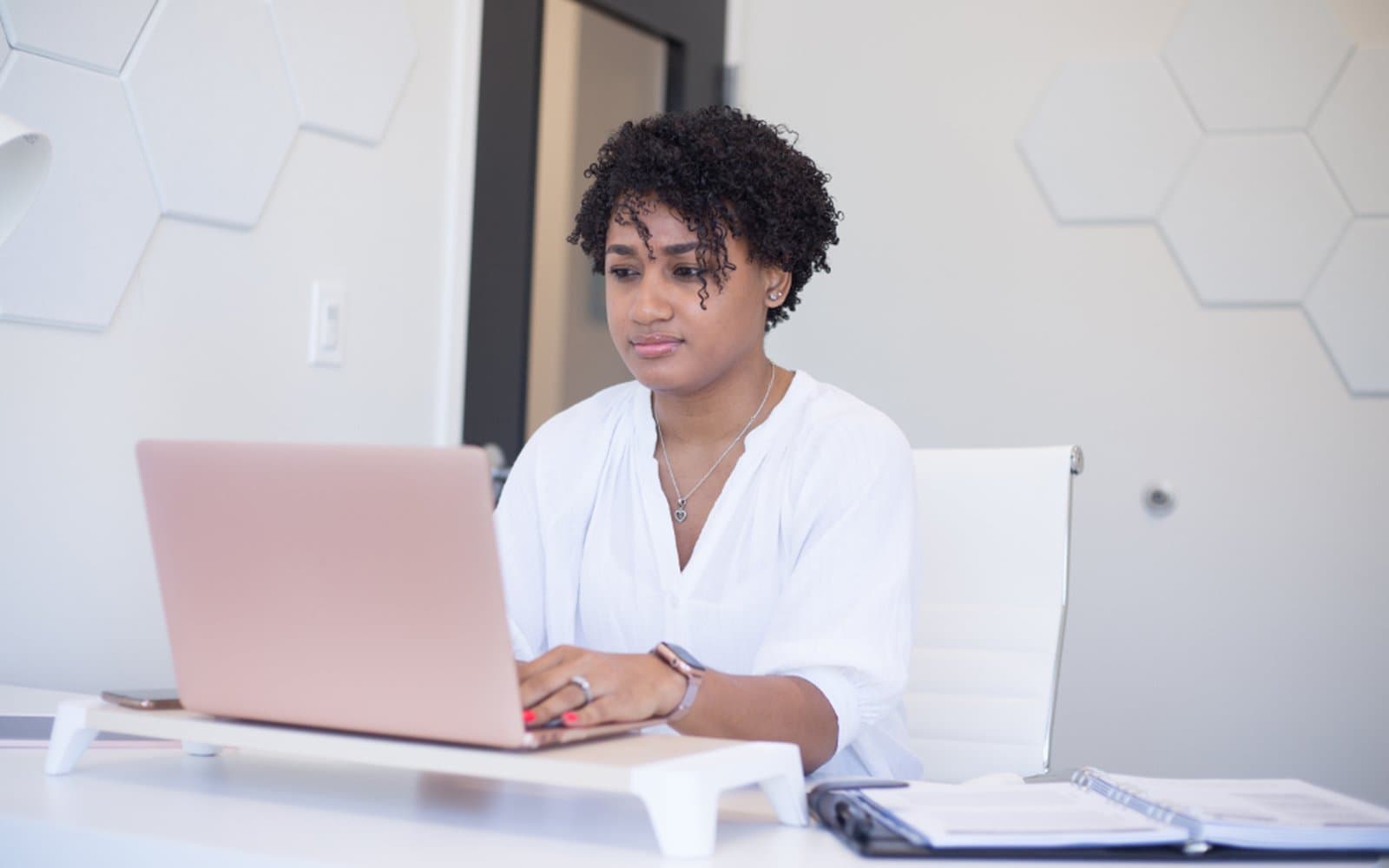 A skilled worker in her office in the UK